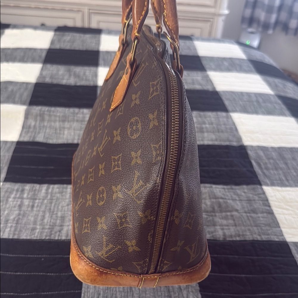 Louis Vuitton Alma Monogram Canvas Handbag - Picture 11 of 14